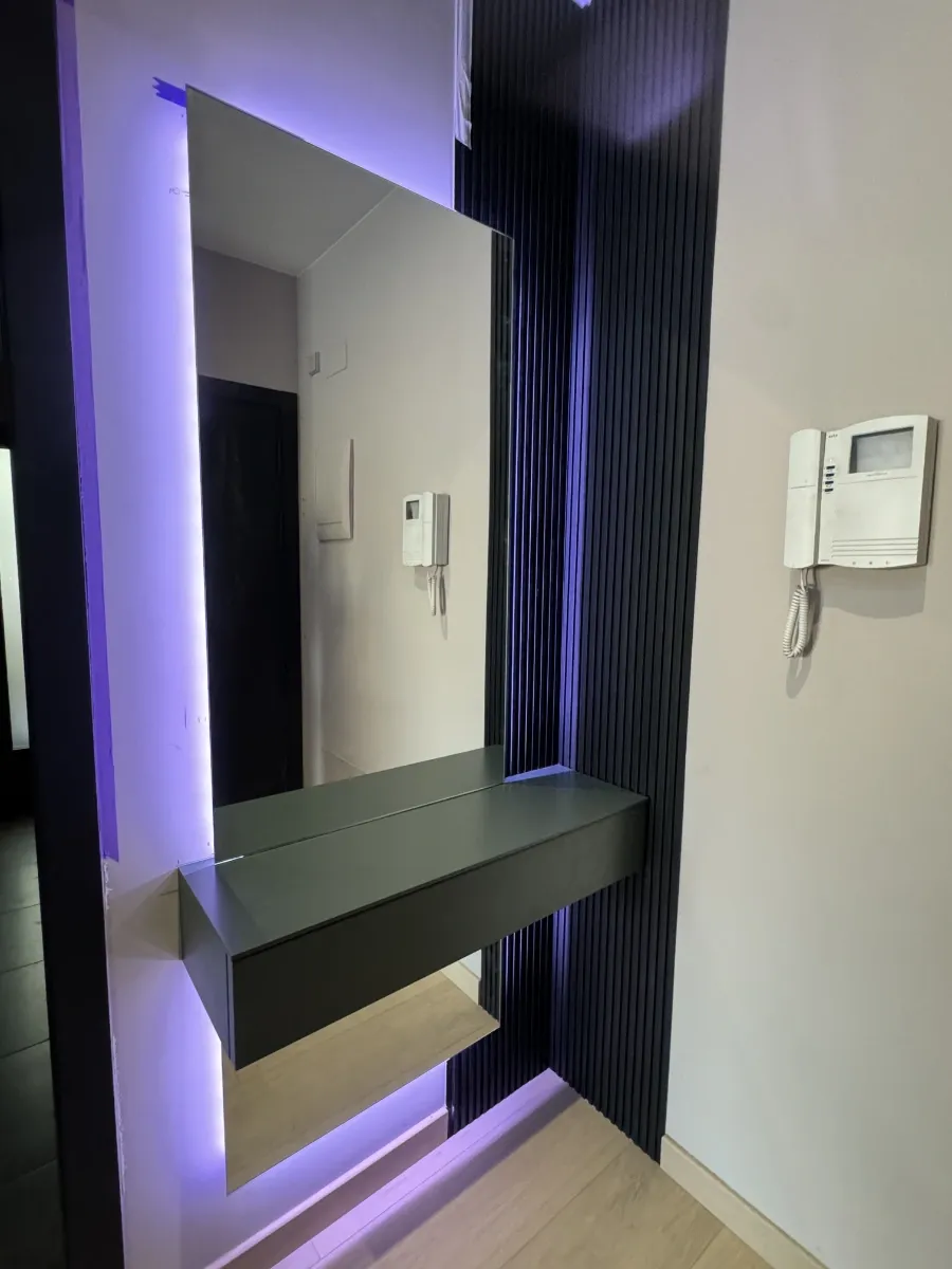 Recibidor reformado en un piso de Sants , Barcelona